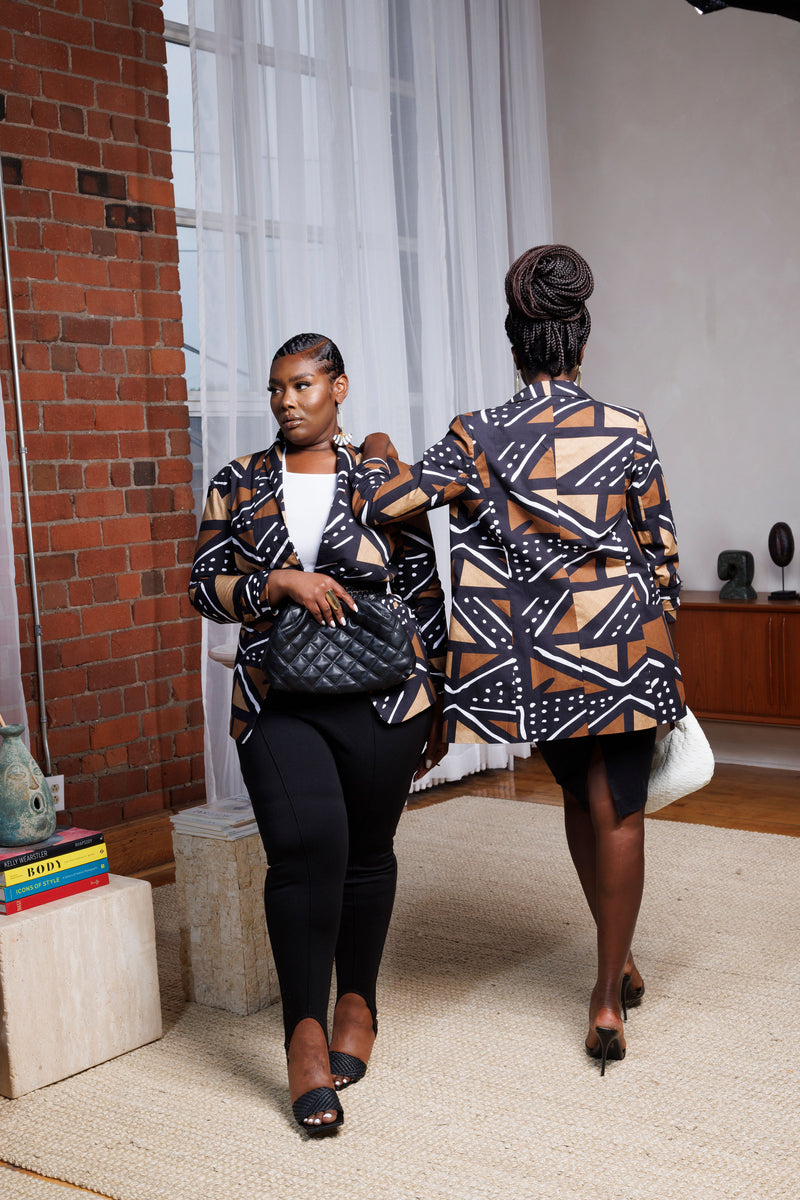 Models wearing Tara African print blazer