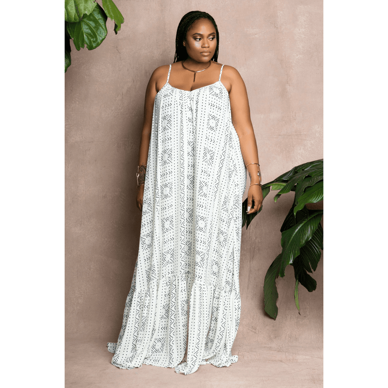 woman wearing african print mudcloth white summer dress