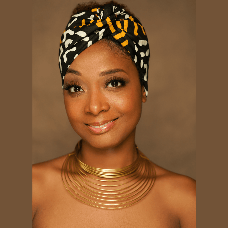 african print headwrap in gold black white