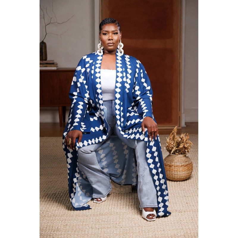 woman wearing blue african print kimono dress