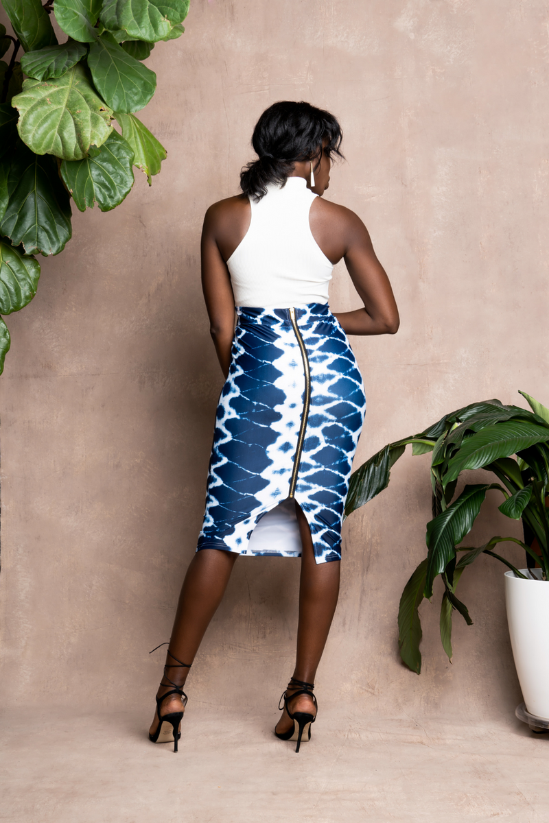 woman wearing african print pencil skirt in blue back