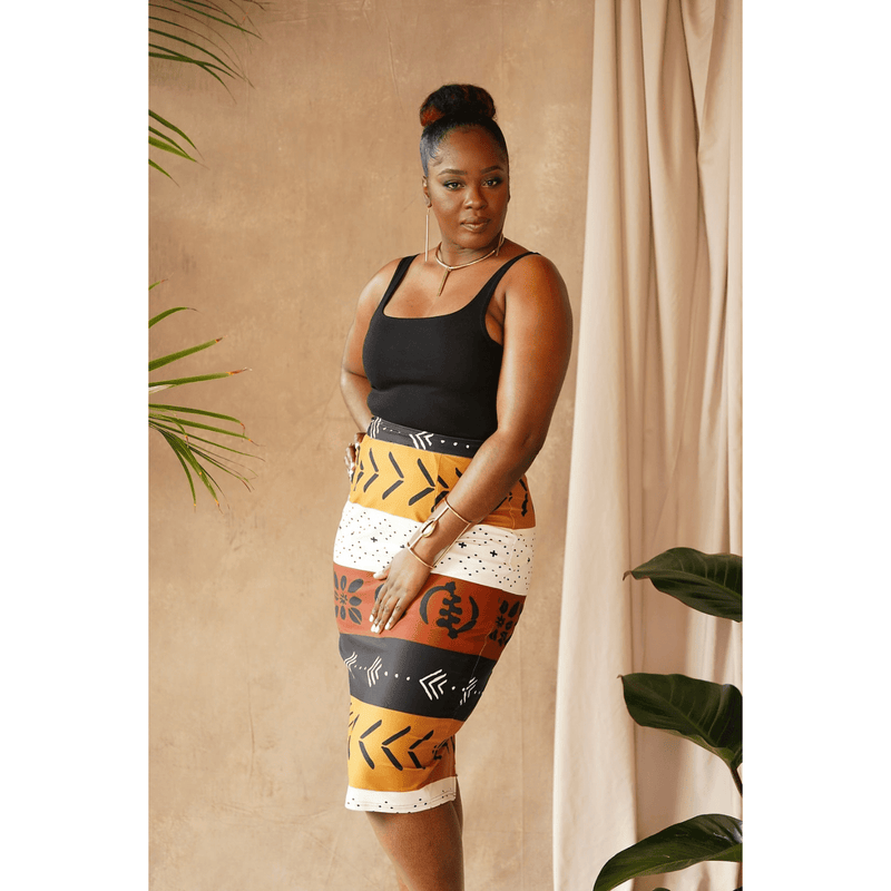 woman wearing african print pencil skirt white, black, brown side