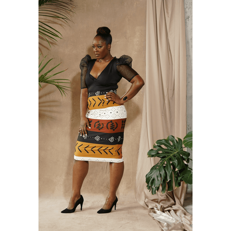 woman wearing african print pencil skirt white, black, brown