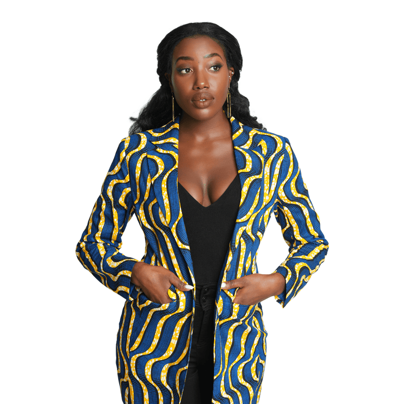 woman wearing african print blazer in blue and yellow front